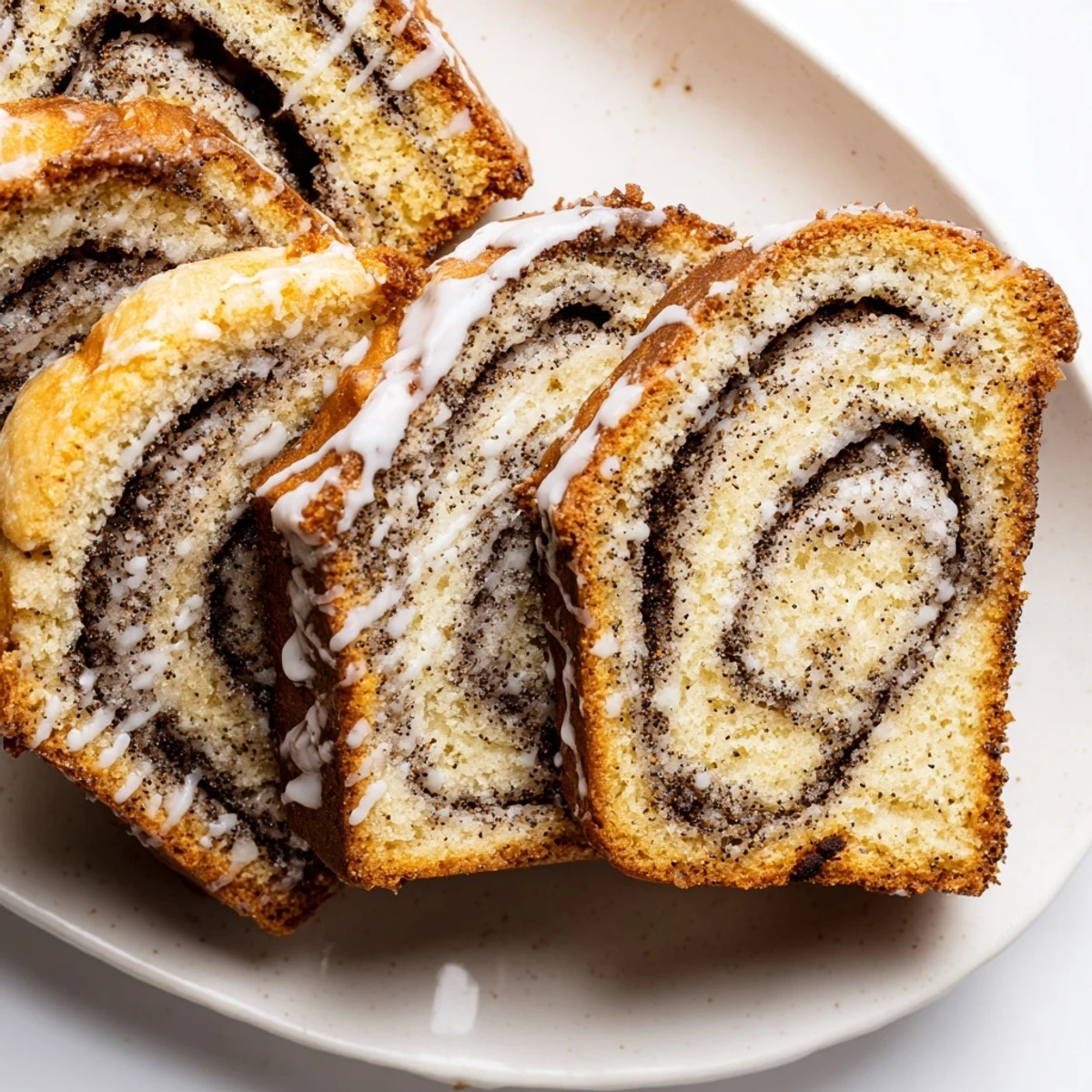 Bakery-style Rebel Float Poppyseed Babka slices showcasing a rich, swirled filling, perfect for dessert.