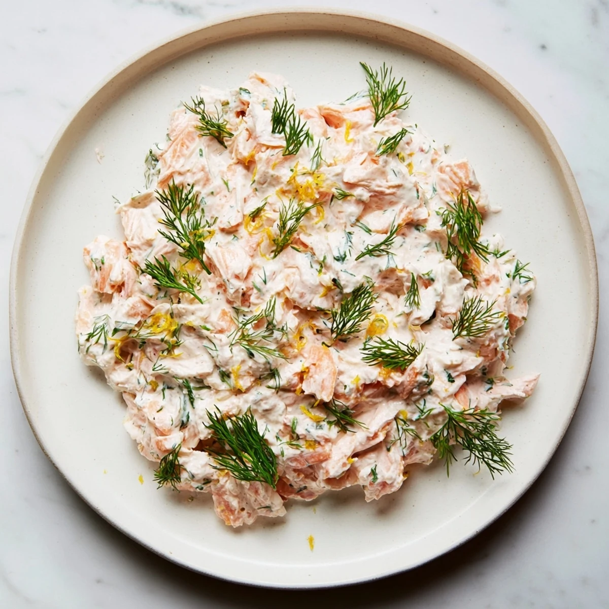 Perfect for gatherings, this Creamy Dill & Horseradish Salmon Spread offers a burst of horseradish next to fresh dill.