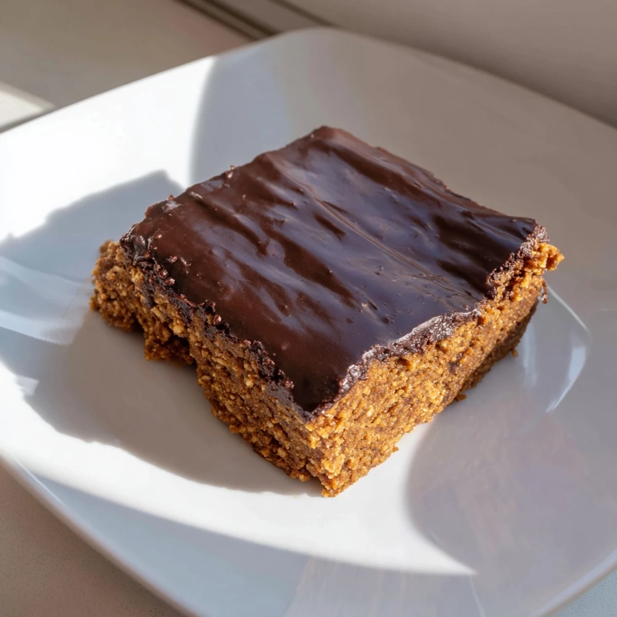Warm and inviting image of Budget Piernik Spice Cookie Bars, glazed and ready to eat.