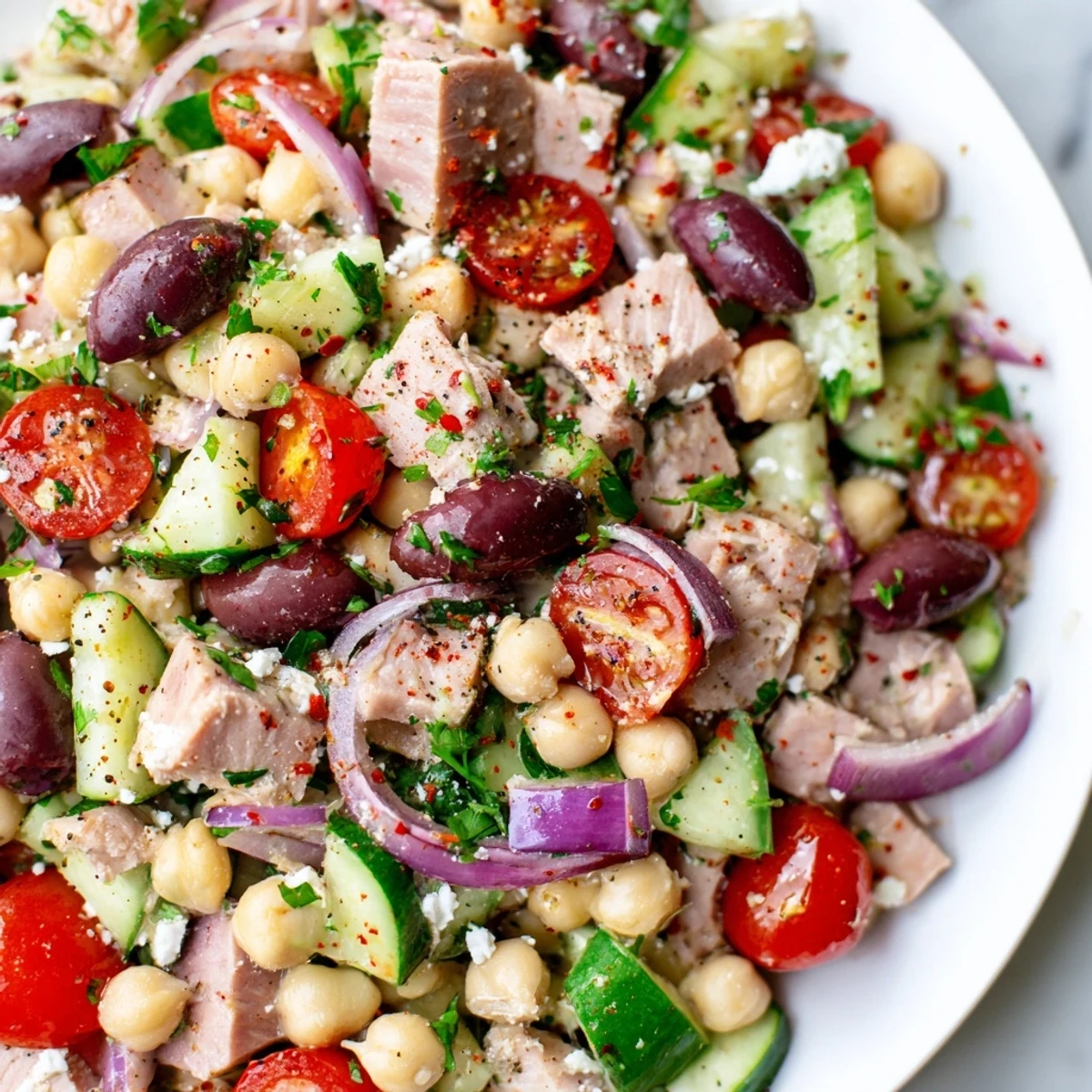 Freshly assembled Tuna Chickpea Salad with tuna and chickpeas; ready to eat or meal prep.