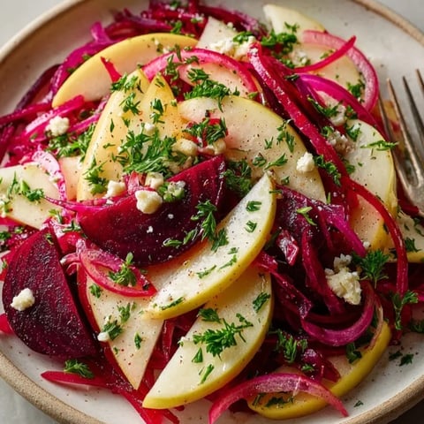 Vibrant quick beet and apple salad, a colorful autumn mix with tangy vinaigrette.