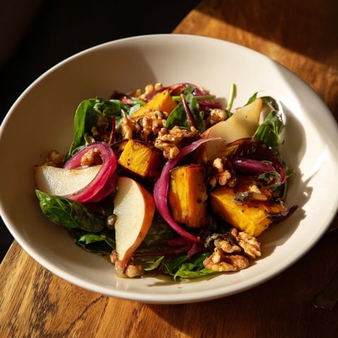 Warm roasted parsnip and pear salad with walnuts, a beautiful starter dish.