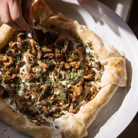 Golden-brown Air Fryer Polish Mushroom Pastry, a savory, flaky appetizer, ready to eat.