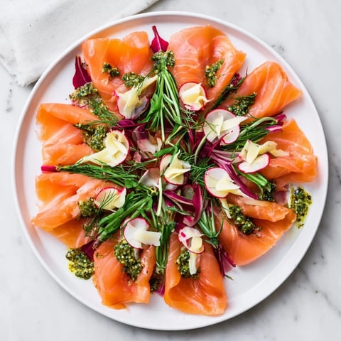 A beautifully arranged Winter Harvest Smoked Salmon Board with toasted bread and dill.