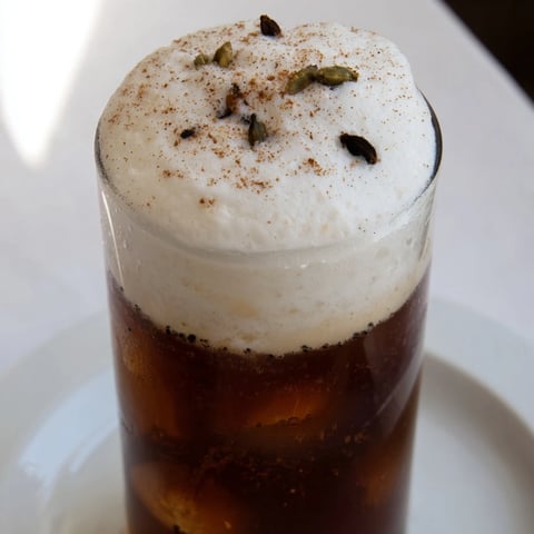 Homemade Iced Chai with Cold Foam, a creamy, spiced refreshment, perfect on a hot summer day.