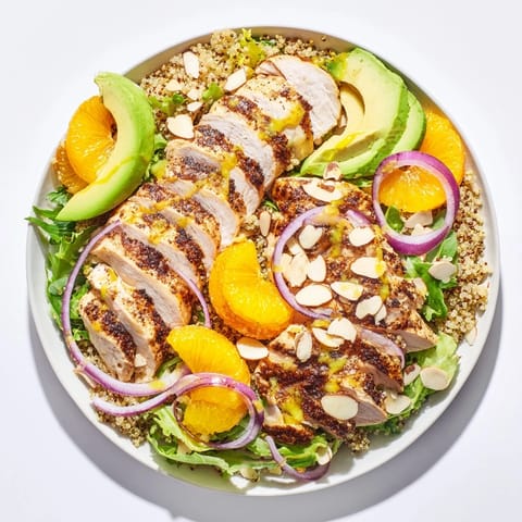 Vibrant Citrus Herb Chicken Salad Bowl with grilled chicken, avocado, and tangy citrus vinaigrette ready to enjoy.