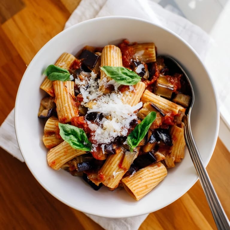 Rigatoni tossed in a rich, chunky tomato sauce for the classic Pasta Alla Norma.